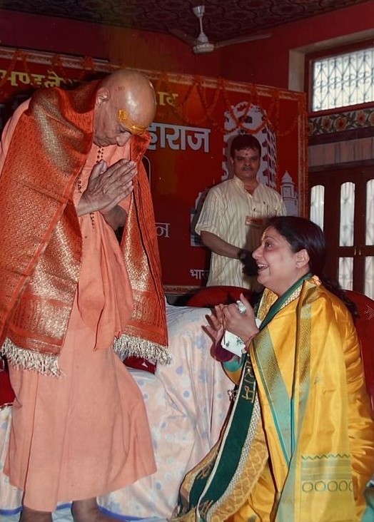 Offering respects to a revered elder saint