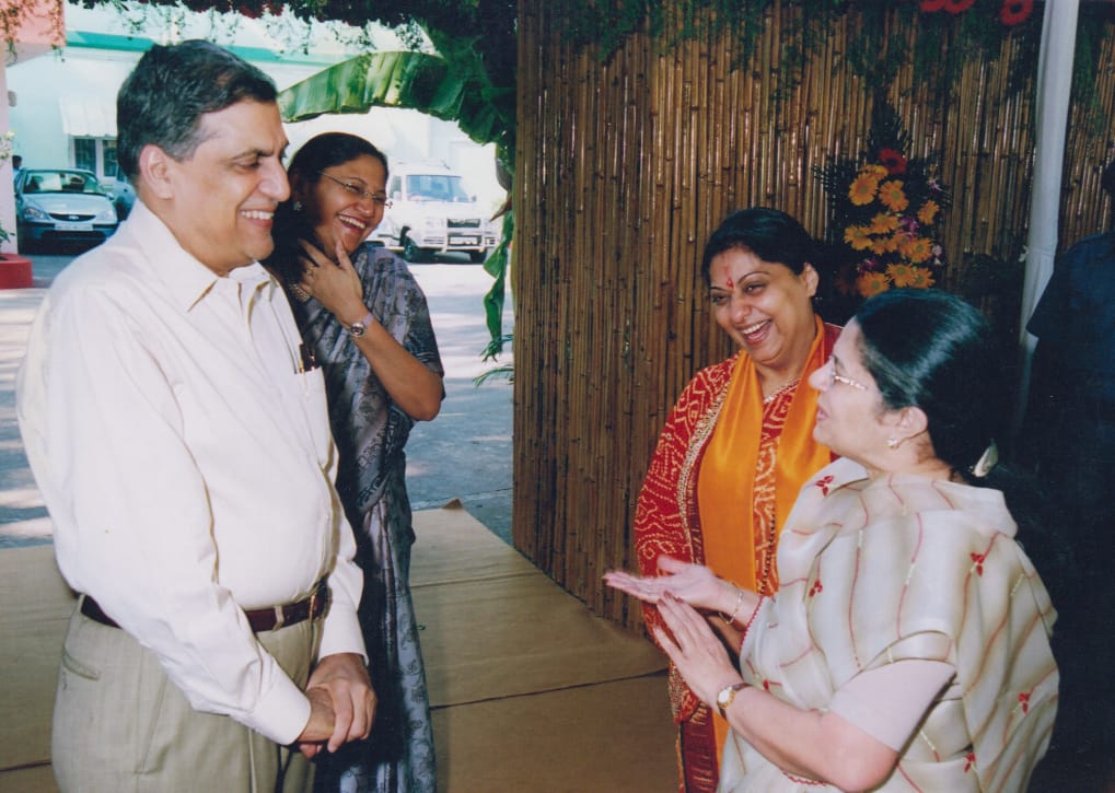Welcoming a former Union Minister at the ashram